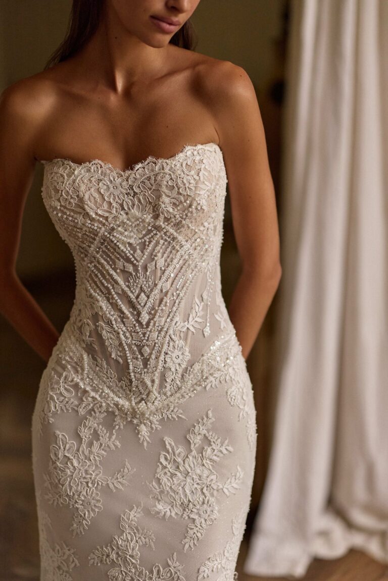 Gleam wedding dress by Lorenzo Rossi by Milla Nova. Fitted Embellished bridal gown with optional long sleeve jacket