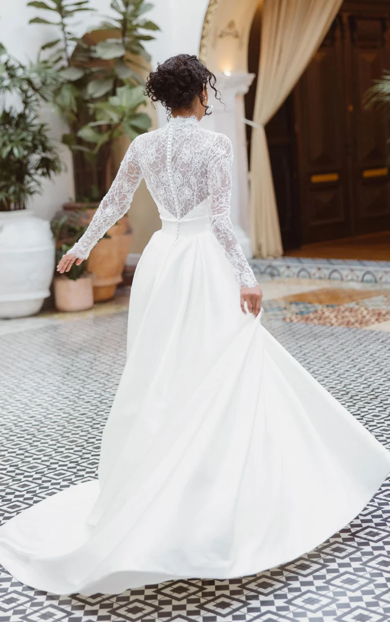 Long sleeve modest covered back ballgown wedding dress by Essense of Australia