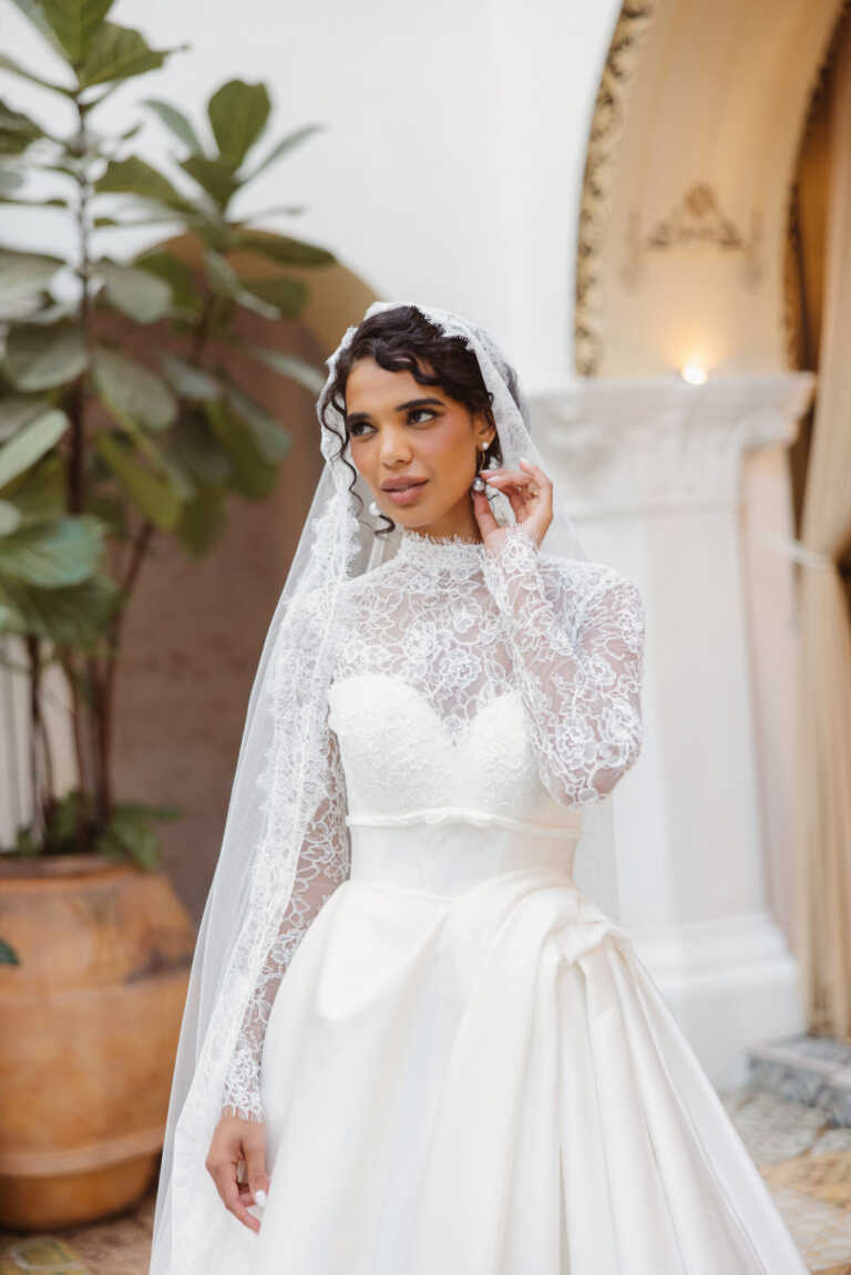 Essense of Australia mikado ballgown with high neck lace long sleeves modest wedding dress teamed with chantilly lace veil