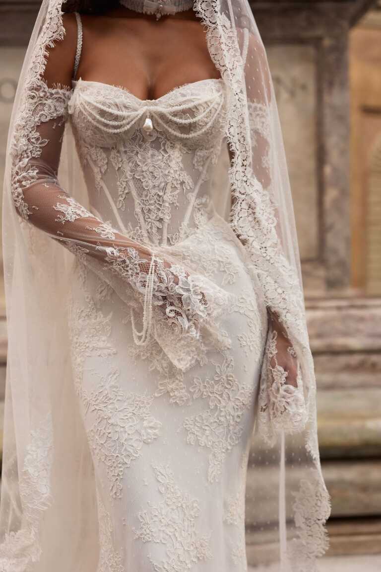 Botticella by Milla Nova wedding dress Fitted chantilly lace with sweetheart neckline and basque waist . Long lace sleeves and matching lace veil optional