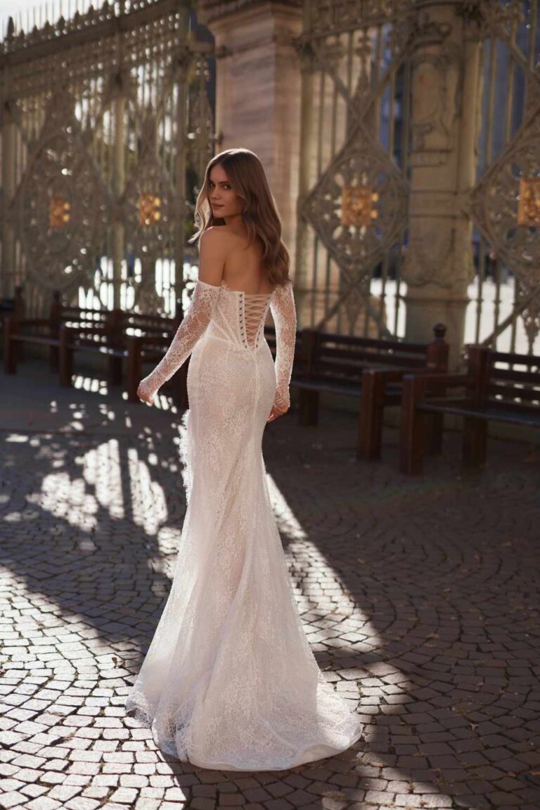 Fitted lace structed corset wedding dress at wedding Belles of Four Oaks by ivory bridal