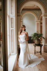 Daphie by Lottie & Meg from Wedding Belles of Four Oaks is a classic crepe fit and flare Wedding dress with a soft spaghetti straps with neck scarf for a elegant look