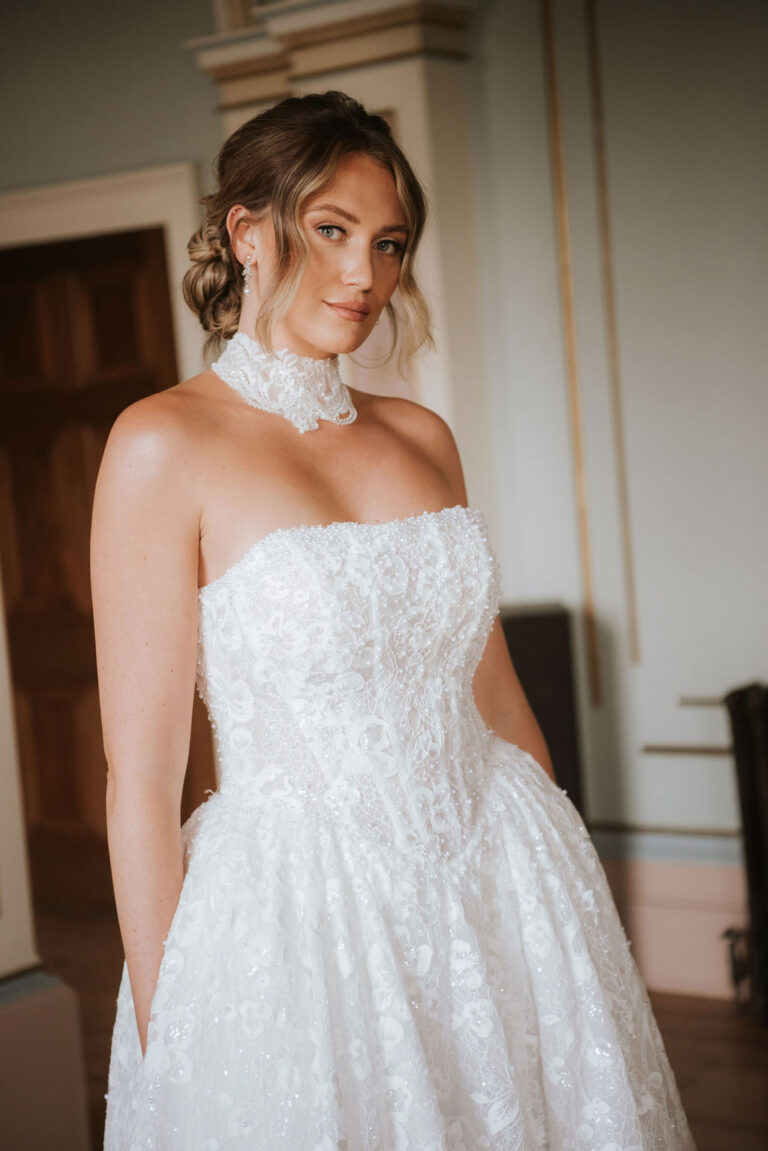 Bellarose by Lottie & Meg from Wedding Belles of Four Oaks Detailed sparkle and pearl lace dramatic ballgown wedding dress with dropped waist basque and straight neckline